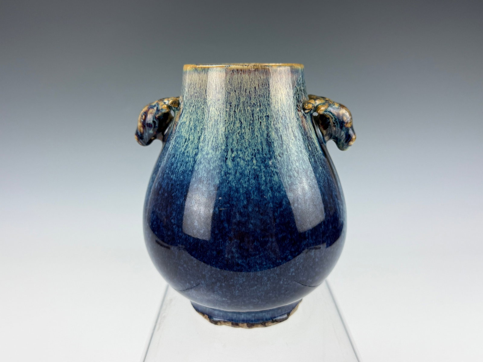 Chinese Flambe Glazed Porcelain Vase with Double Deer Handles: Chinese Flambe Glazed Porcelain Vase with Double Deer Handles. H 16.6 cm(6.5 in.) x D 7 cm(2.8 in.). Preview from Aug 24th to 28th from 1:00 PM TO 5:00 PM Eastern Time, Location: 15229 Display Court, 