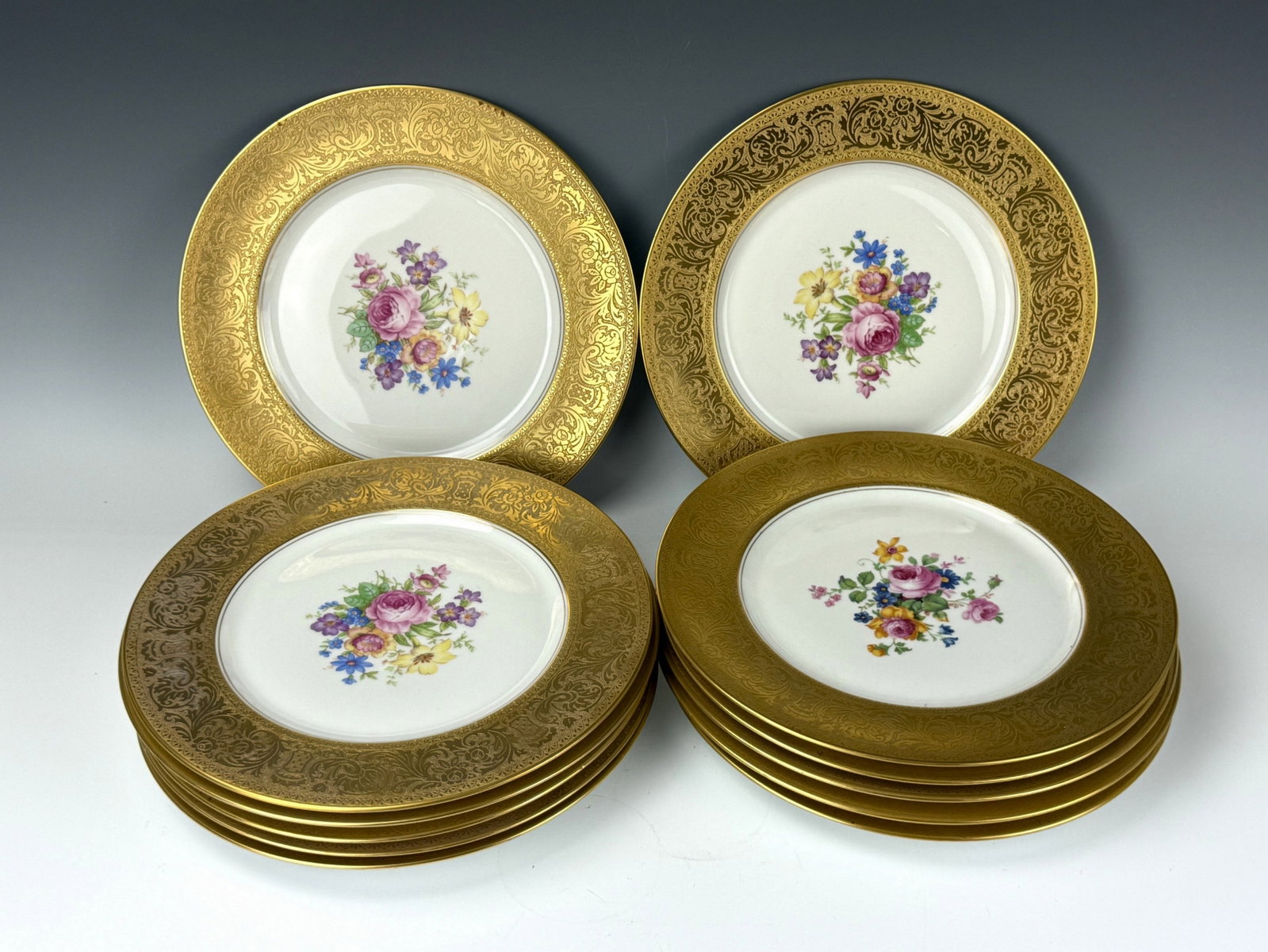 Set of 12 Heinrich & Co. Selb Bavaria 22k Gold Encrusted Floral Plates: Set of 12 Heinrich & Co. Selb Bavaria 22k Gold Encrusted Floral Plates. D 27.7 cm(10.9 in.). Preview from Aug 24th to 28th from 1:00 PM TO 5:00 PM Eastern Time, Location: 15229 Display Court, Rockvill