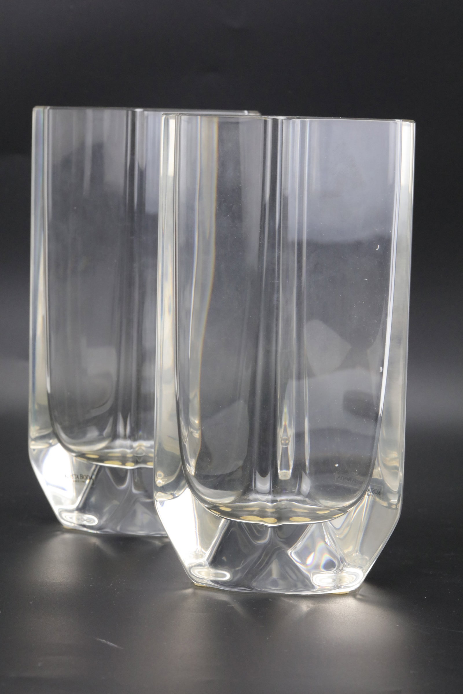 Pair of Kosta Boda Clear Crystal Vases: Pair of Kosta Boda Clear Crystal Vases. H 21 cm(8.2 in.).?Preview from Aug 24th to 28th from 1:00 PM TO 5:00 PM Eastern Time, Location: 15229 Display Court, Rockville, MD 20850.