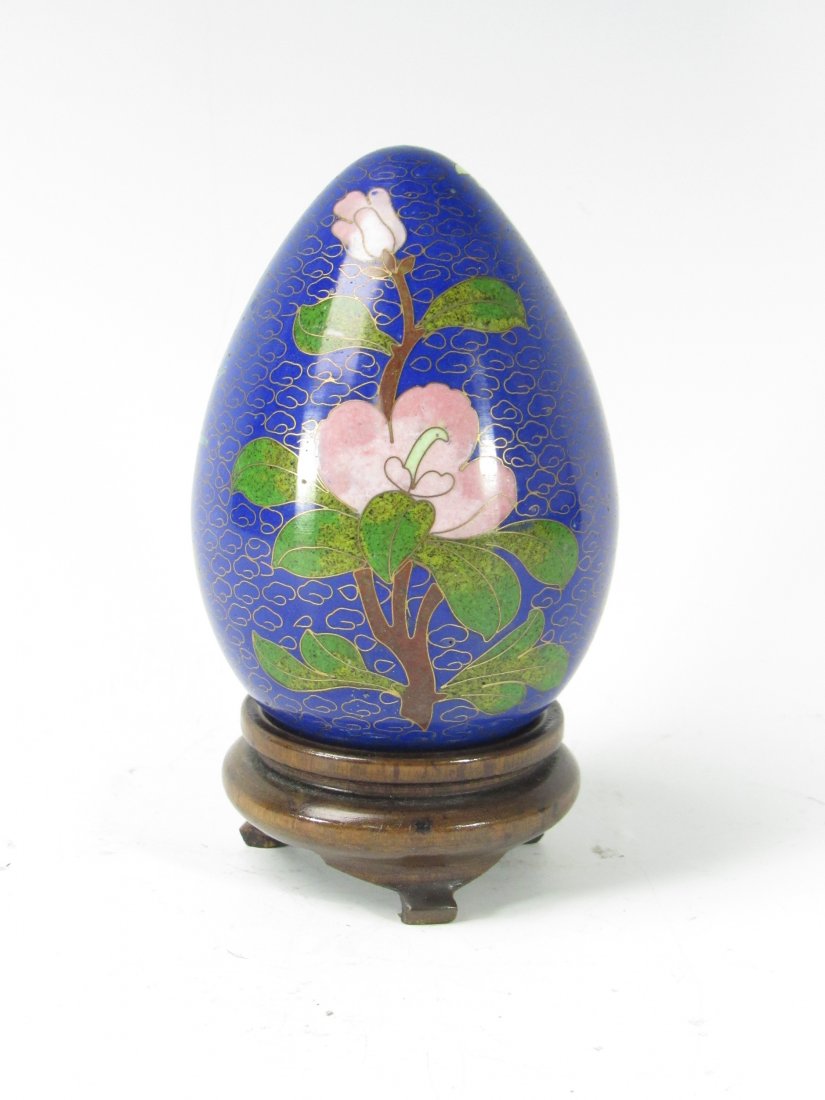 Chinese Cloisonne Enamel Egg Ornament On Wooden Stand: Chinese Cloisonne Enamel Egg Ornament On Wooden Stand. Good Condition. Measures 4-1/2" Tall. Total Weight 210.7 Grams.