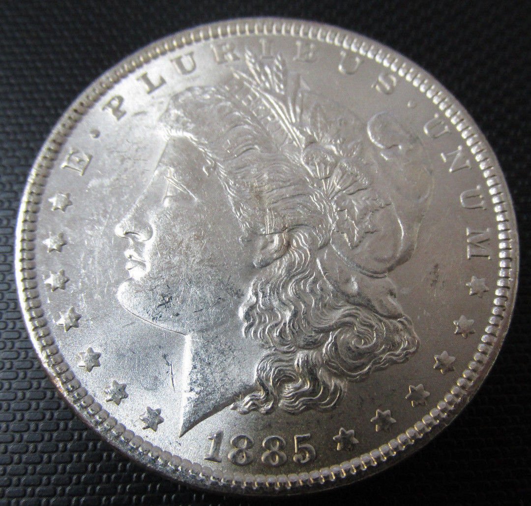 1885 $1 Morgan Silver Dollar: 1885 $1 Morgan Silver Dollar. Good condition. Measurements/Size: 1 1/2" Diameter