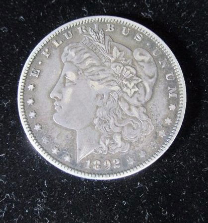 1892O Morgan silver Dollar some scratches and signs of (1 of 4)