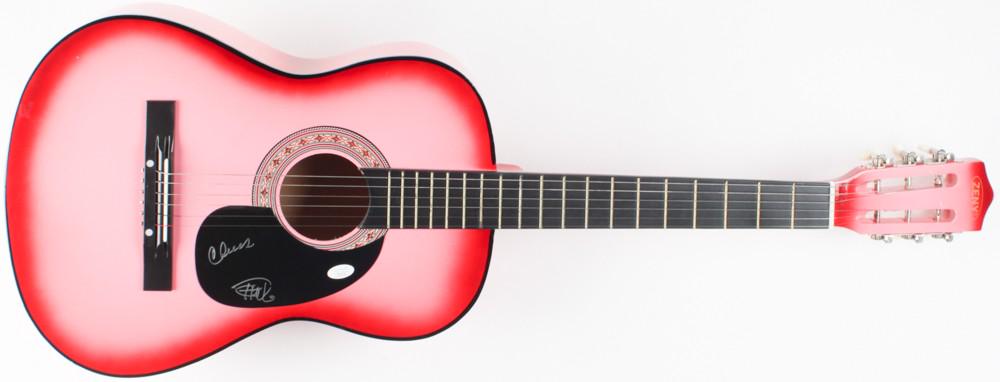 Cheech Marin & Tommy Chong Signed Full-Size Acoustic: Zeny acoustic guitar measures approximately 39" in length and is hand-signed on the pickguard by Cheech Marin and Tommy Chong. Please see photos for more details regarding the condition of the guitar.