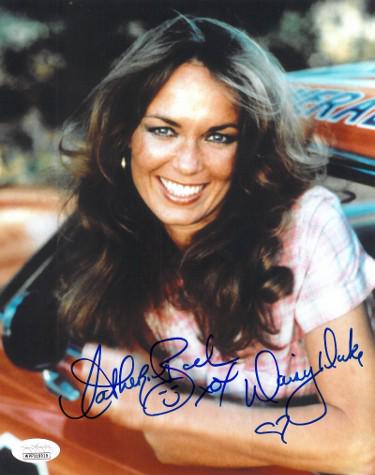 Catherine Bach signed Dukes of Hazzard 8x10 Photo Daisy: Catherine Bach is an American actress. She is known for playing Daisy Duke in the television series The Dukes of Hazzard and Margo Dutton in African Skies. Catherine Bach has hand autographed this Duk