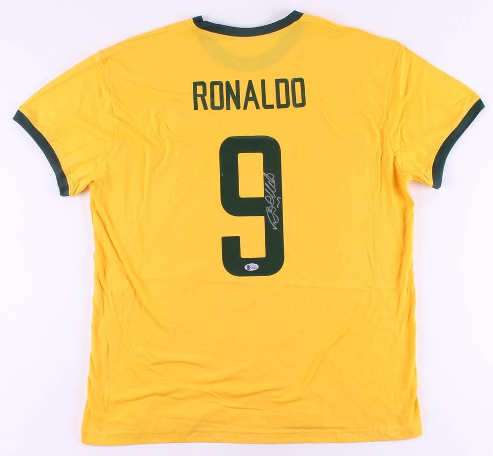 Ronaldo Signed Jersey: Custom on-field style jersey. Everything is printed on, size XL. Has been hand-signed by Ronaldo. The lot / autograph(s) includes an official Beckett Authentication Services serially-numbered hologram