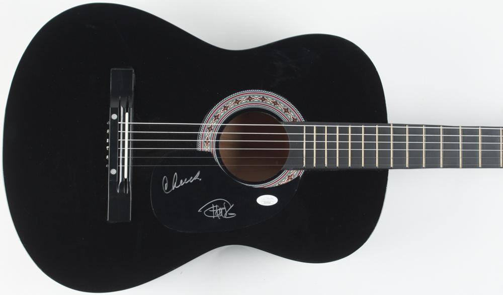 Cheech Marin & Tommy Chong Signed Full-Size Acoustic: Zeny acoustic guitar measures approximately 39" in length and is hand-signed on the pickguard by Cheech Marin and Tommy Chong. Please see photos for more details regarding the condition of the guitar.