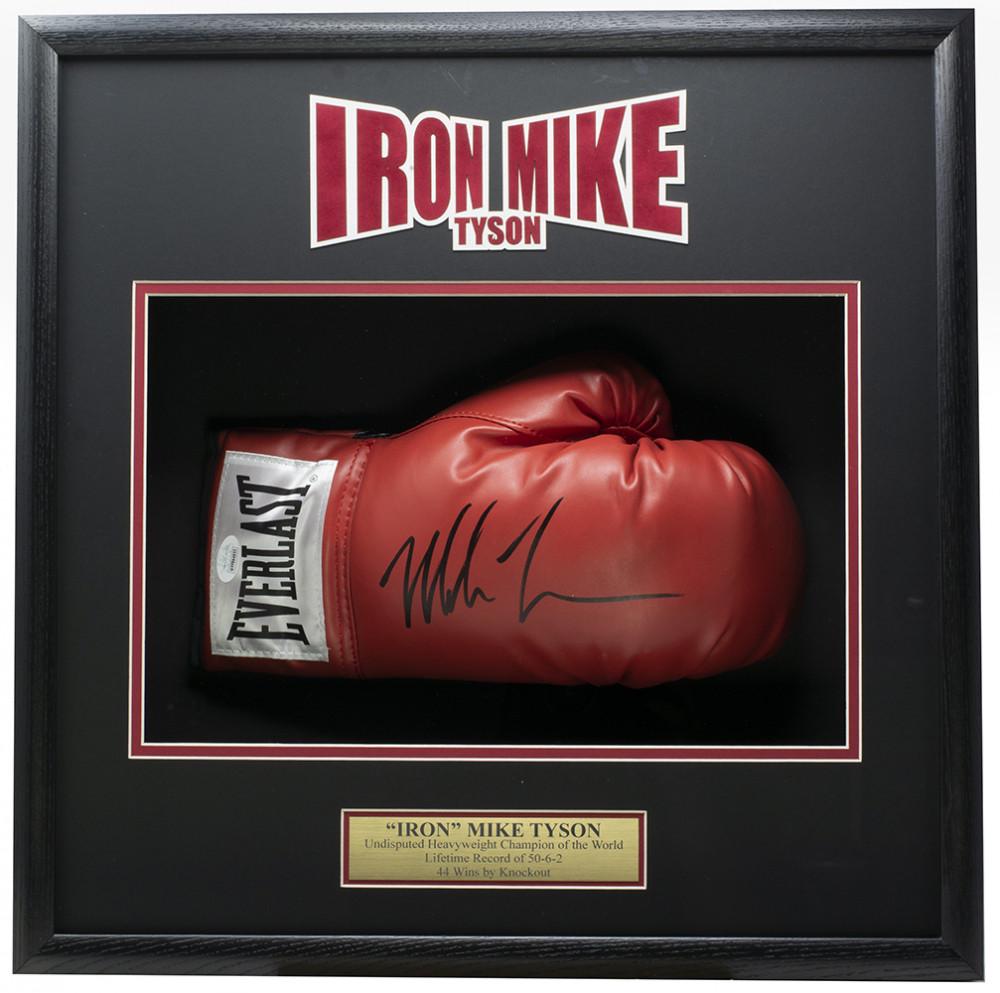 Mike Tyson Signed 4x18x19 Custom Framed Boxing Glove: Custom display measures 4" x 18" x 19" in size and features an Everlast Boxing glove that has been hand-signed by Mike Tyson (HOF). Mike Tyson holds the record as the youngest boxer to win the WBC, WB