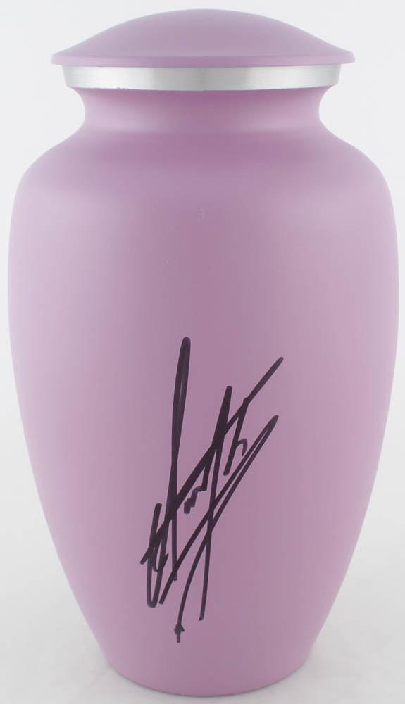 The Undertaker Signed Urn (JSA COA & Fiterman Hologram): Replica urn measures approximately 11" in height and has been hand-signed by The Undertaker. The lot / autograph(s) includes an official James Spence Authentication (JSA) hologram and matching COA, as