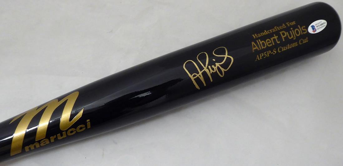 Albert Pujols Autographed Marucci Game Model Bat Los: This is a Marucci game model baseball bat that has been hand signed by Albert Pujols. This item has been certified authentic by Beckett (BAS) and comes with their tamper-proof sticker and matching cer