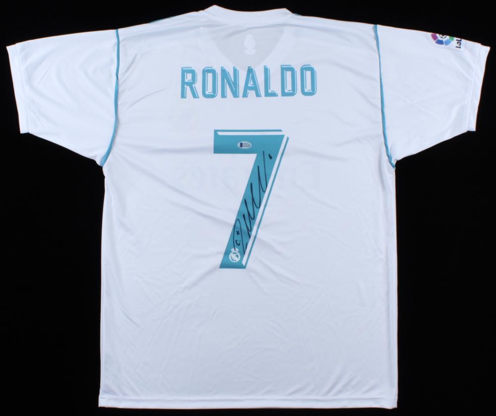 Cristiano Ronaldo Signed Jersey (Beckett COA): Custom on-field style jersey. Everything is printed on, size L. Hand-signed by Cristiano Ronaldo.The lot / autograph(s) includes an official Beckett Authentication Services serially numbered hologram 