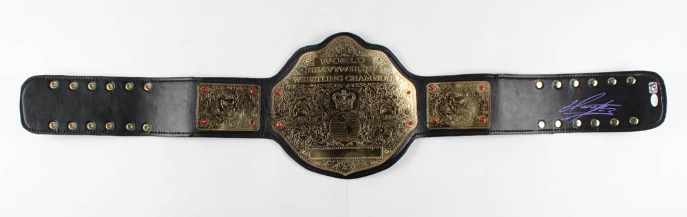 The Undertaker Signed World Heavyweight Wrestling: Replica World Heavyweight Wrestling Champion belt has been hand-signed by The Undertaker (Mark Calaway). The lot / autograph(s) includes an official James Spence Authentication (JSA) hologram and matc