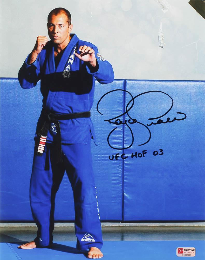 Royce Gracie Signed UFC 11x14 Photo Inscribed "UFC HOF: Royce Gracie Signed UFC 11x14 Photo Inscribed "UFC HOF 03" (PA COA)