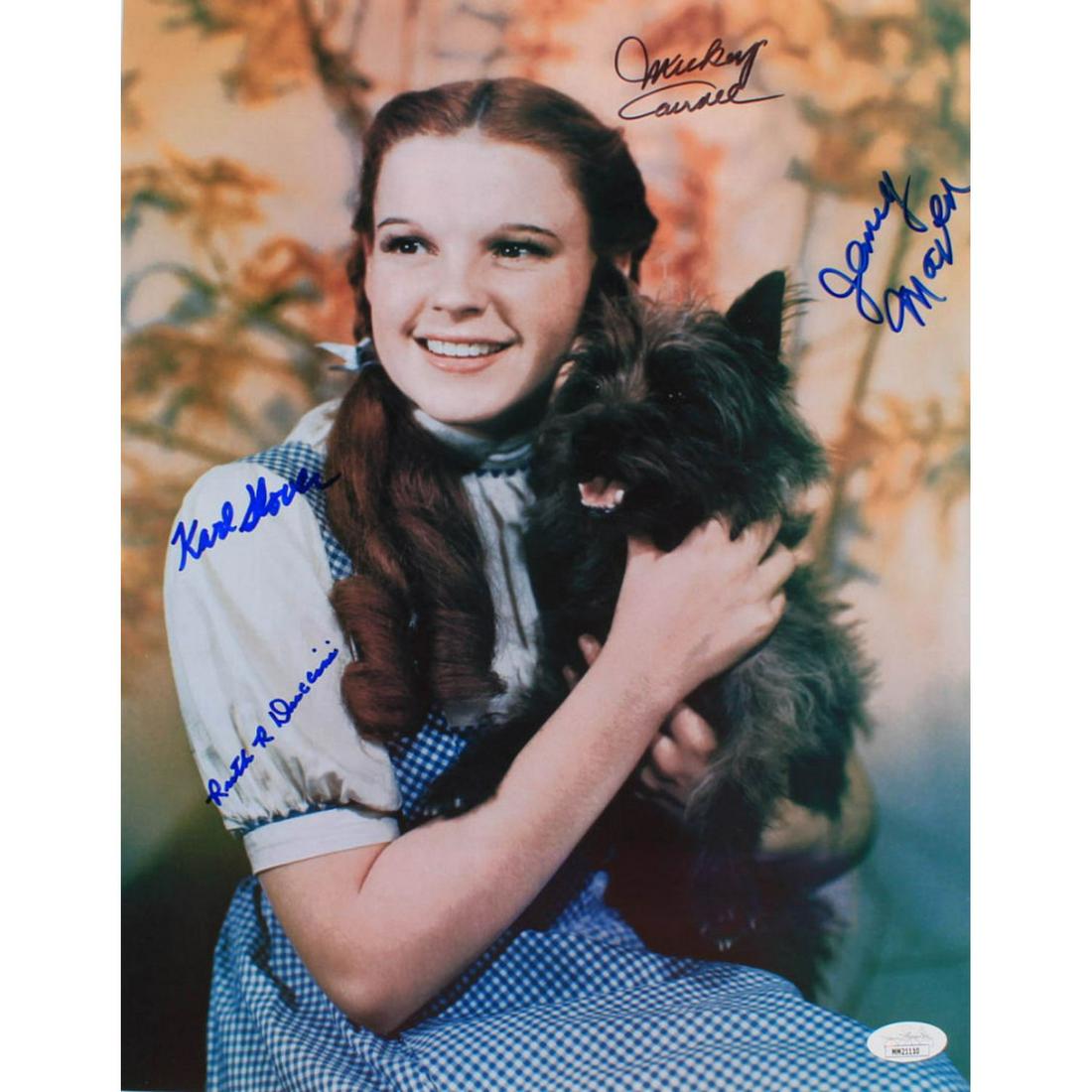 "The Wizard of Oz" 11x14 Photo Cast-Signed by (4) with: Photo measures 11" x 14" in size and has been hand-signed by Mickey Carroll, Jerry Maren, Karl Slover and Ruth Duccini.The lot / autograph(s) includes an official James Spence Authentication (JSA) hol