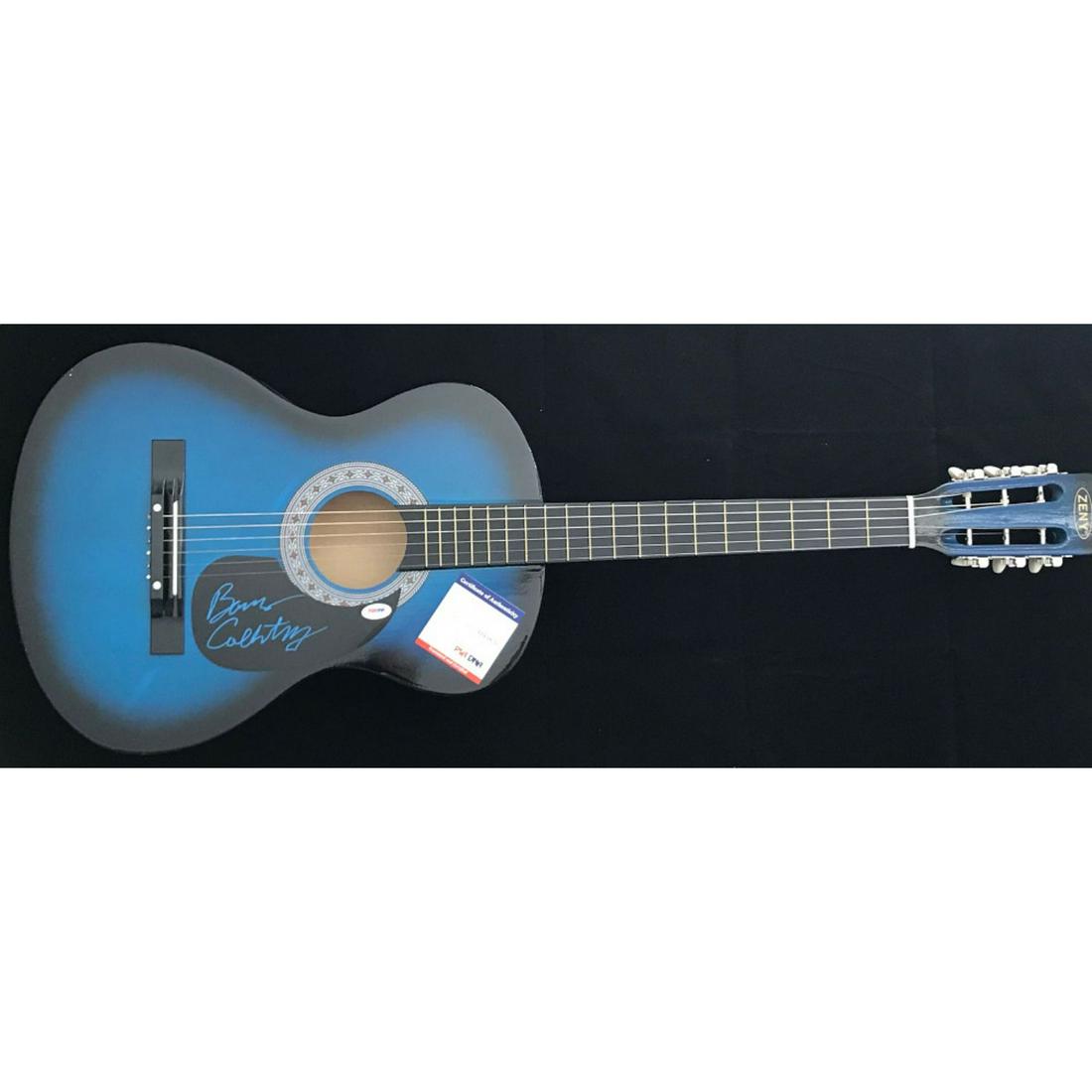 Barns Courtney Signed Full-Size Acoustic Guitar (PSA: Acoustic guitar measures approximately 38" in length and is hand-signed on the pick guard by Barns Courtney.The lot / autograph(s) includes an official PSA/DNA hologram and matching COA for authentici
