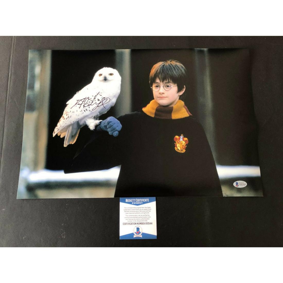 DANIEL RADCLIFFE SIGNED 'HARRY POTTER' 12X18 PHOTO: DANIEL RADCLIFFE SIGNED 'HARRY POTTER' 12X18 PHOTO AUTHENTIC AUTOGRAPH BECKETT