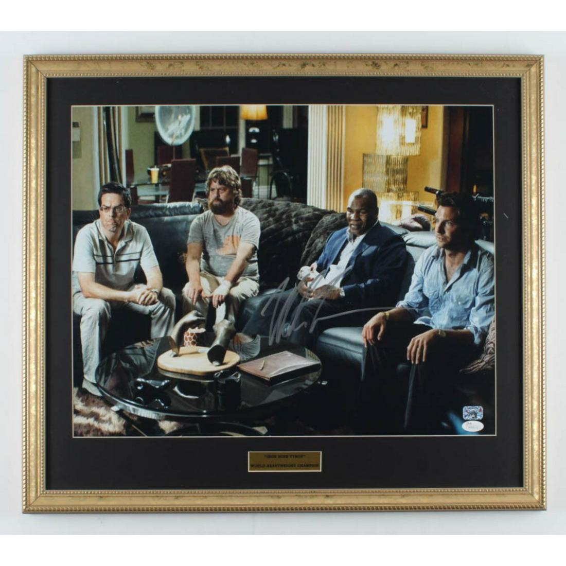 Mike Tyson Signed "The Hangover" 21x24 Custom Framed: The custom frame measures 21" x 24" in size and has been hand-signed by Mike Tyson.The lot / autograph(s) includes an official Fiterman Sports Group hologram, as well as an official James Spence Authe