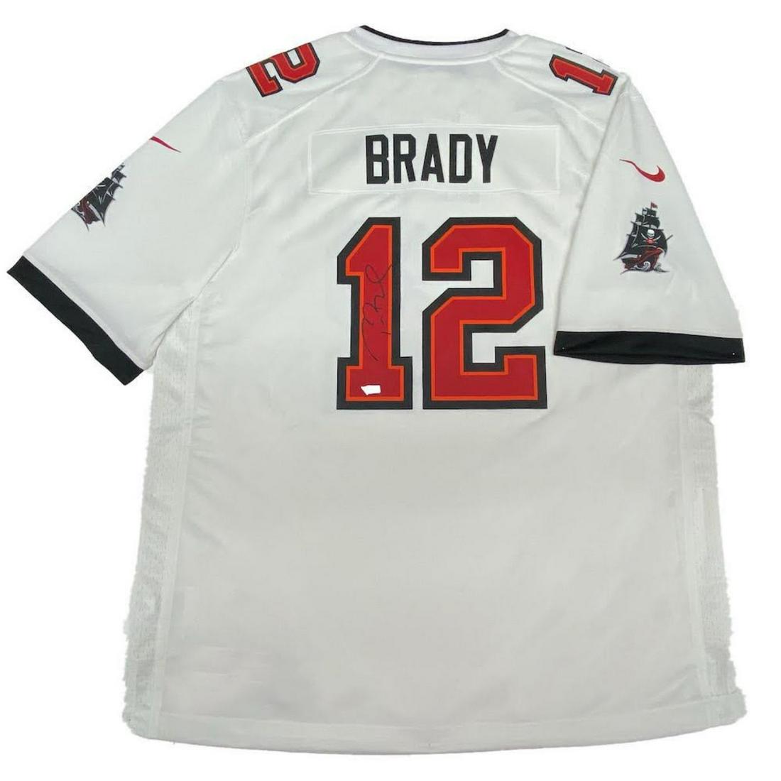 Tom Brady Signed Buccaneers Jersey (Fanatics Hologram): Nike on-field style jersey. Everything is silk screened on, size L. Hand-signed by Tom Brady (Tampa Bay Buccaneers). The lot / autograph(s) includes an official Fanatics hologram for authenticity purp