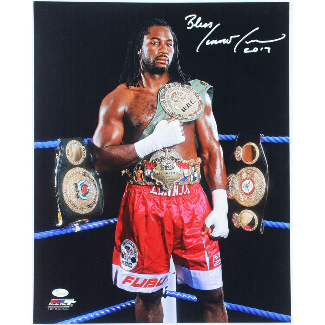 Lennox Lewis Signed 16x20 Photo Inscribed "Bless" &: Photo measures 16" x 20" in size and has been hand-signed by Lennox Lewis. Please see images for details regarding the condition.The lot / autograph(s) includes an official James Spence Authentication