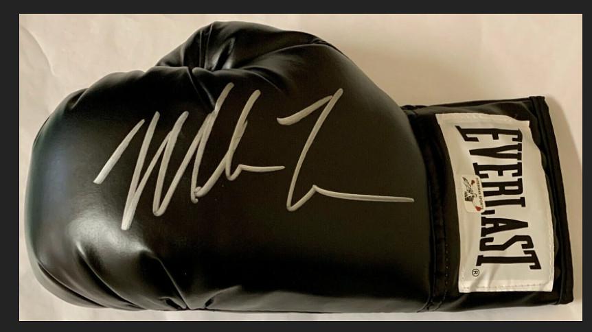 Mike Tyson Signed Everlast Gloves Black bas coa (1 of 1)
