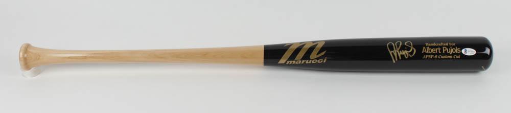 Albert Pujols Signed Marucci Player Model Baseball Bat: Marucci player model baseball bat. Hand-signed by Albert Pujols (Los Angeles Angels).The lot / autograph(s) includes an official Beckett Authentication Services serially-numbered hologram and matching