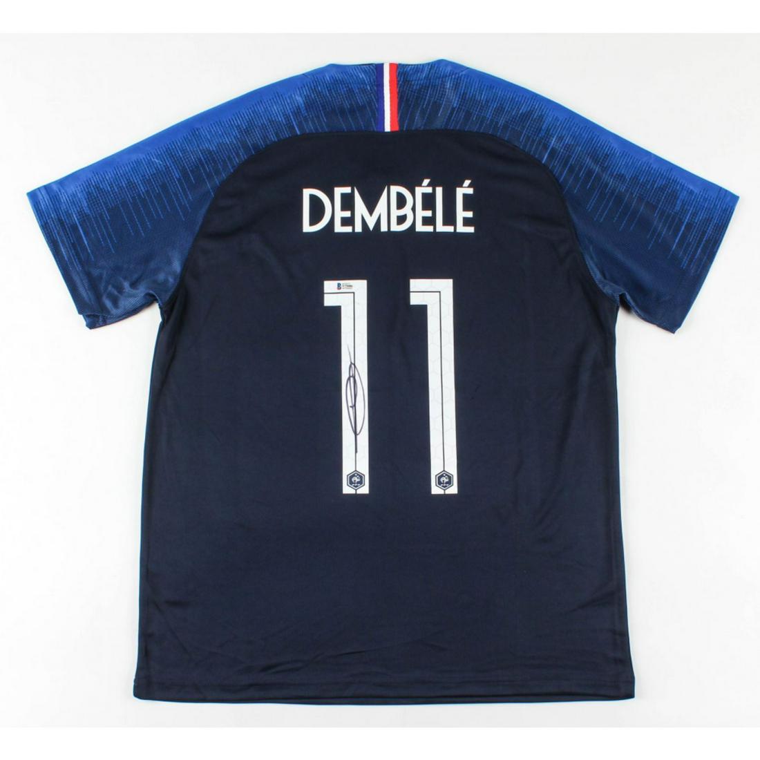Ousmane Dembele Signed Team France Jersey (Beckett COA): Nike on-field style jersey. Everything is printed on, size XL. Has been hand-signed by Ousmane Dembele.The lot / autograph(s) includes an official Beckett Authentication Services serially-numbered hol
