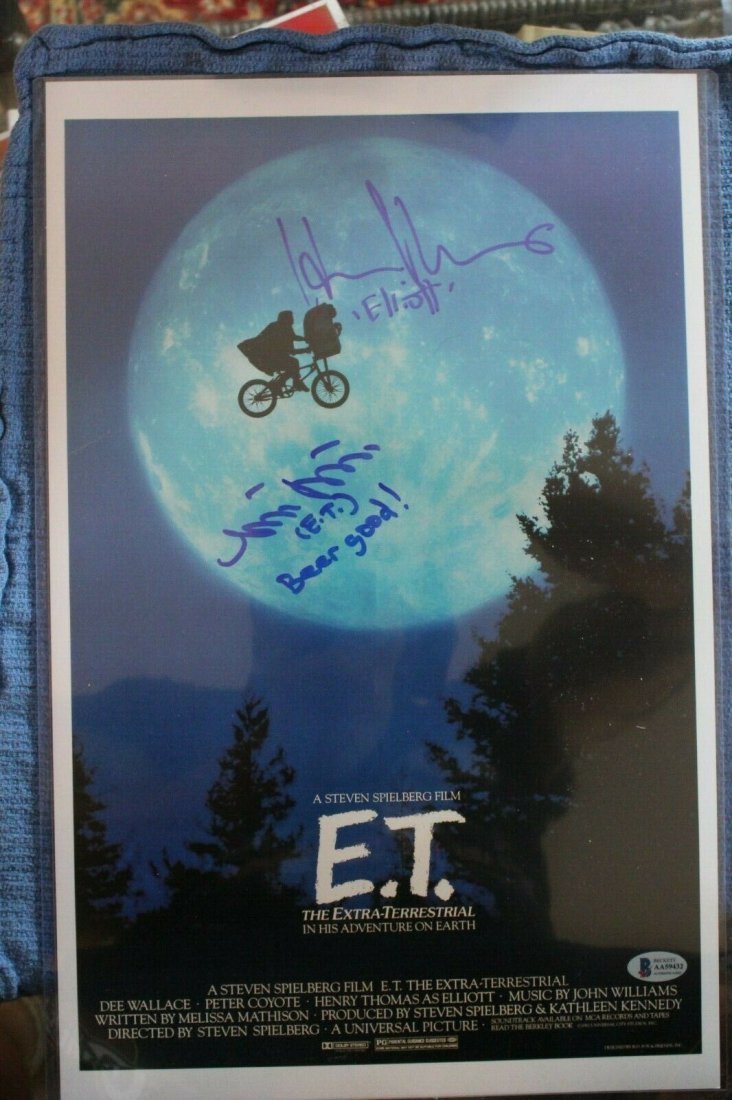 E.T. signed 11x17 movie photo by Henry Thomas and Matth: E.T. signed 11x17 movie photo by Henry Thomas and Matthew DeMeritt, Beckett COA