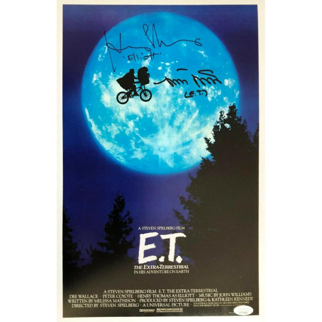 Henry Thomas & Matthew De Merrit Dual Signed 11x17 "E.T." Movie Poster (JSA COA): Henry Thomas & Matthew De Merrit Dual Signed 11x17 "E.T." Movie Poster (JSA COA)