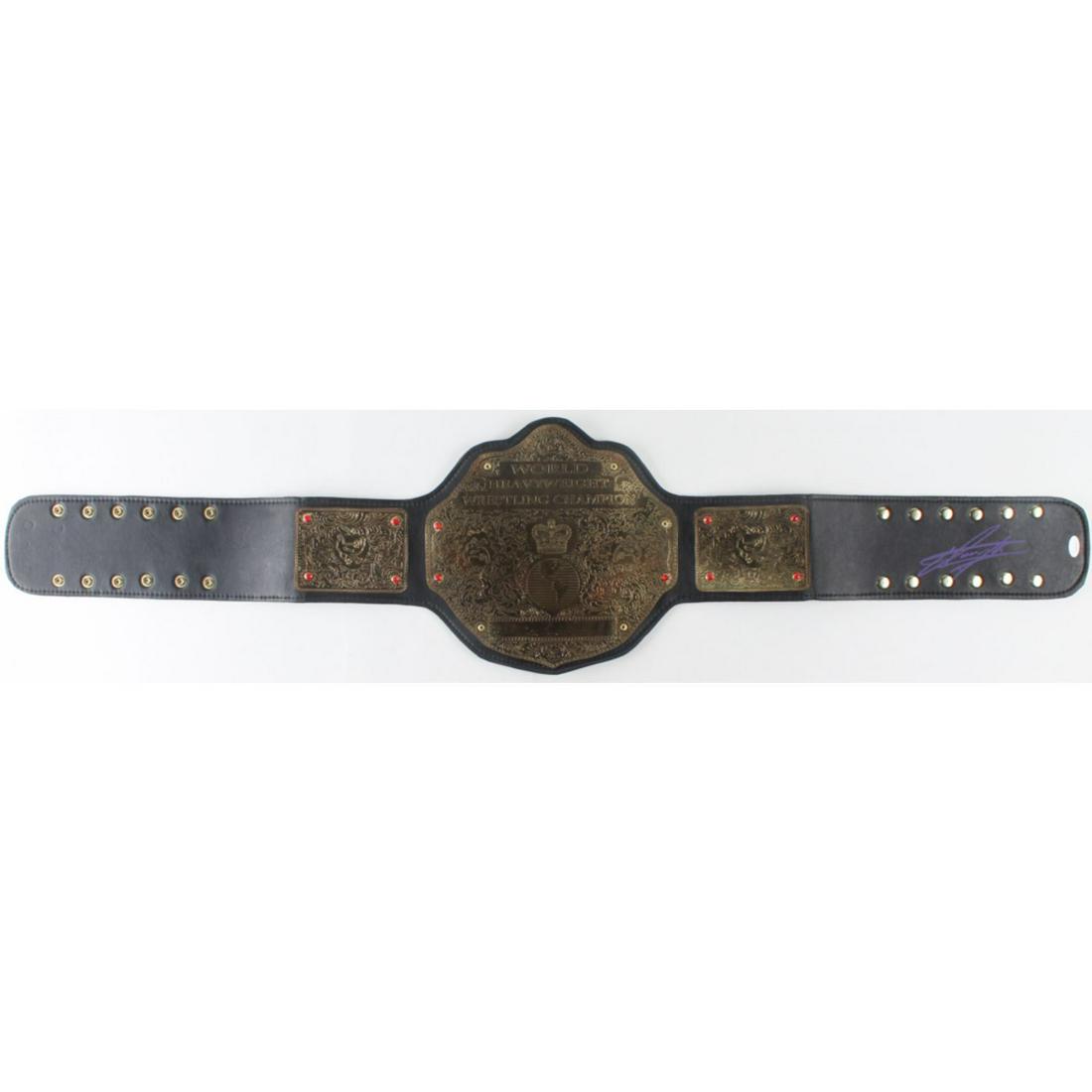 The Undertaker Signed World Heavyweight Wrestling Champion Belt: Replica belt has been hand-signed by Mark Calaway (The Undertaker).The lot / autograph(s) includes an official James Spence Authentication (JSA) hologram and matching COA for authenticity purposes. Th