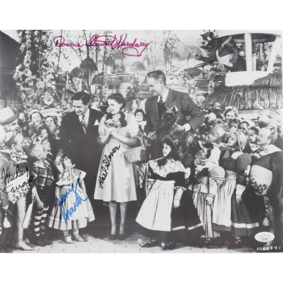 "The Wizard of Oz" 11x14.5 Photo Cast-Signed by (4) with Karl Slover, Mickey Carroll, Donna: "The Wizard of Oz" 11x14.5 Photo Cast-Signed by (4) with Karl Slover, Mickey Carroll, Donna Stewart-Hardaway & Jerry Maren (JSA COA)