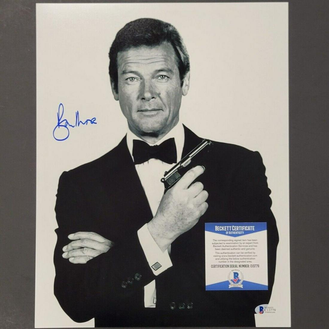 SIR ROGER MOORE Signed 007 James Bond 11x14 Photo autograph ~ Beckett BAS COA: SIR ROGER MOORE Signed 007 James Bond 11x14 Photo autograph ~ Beckett BAS COA