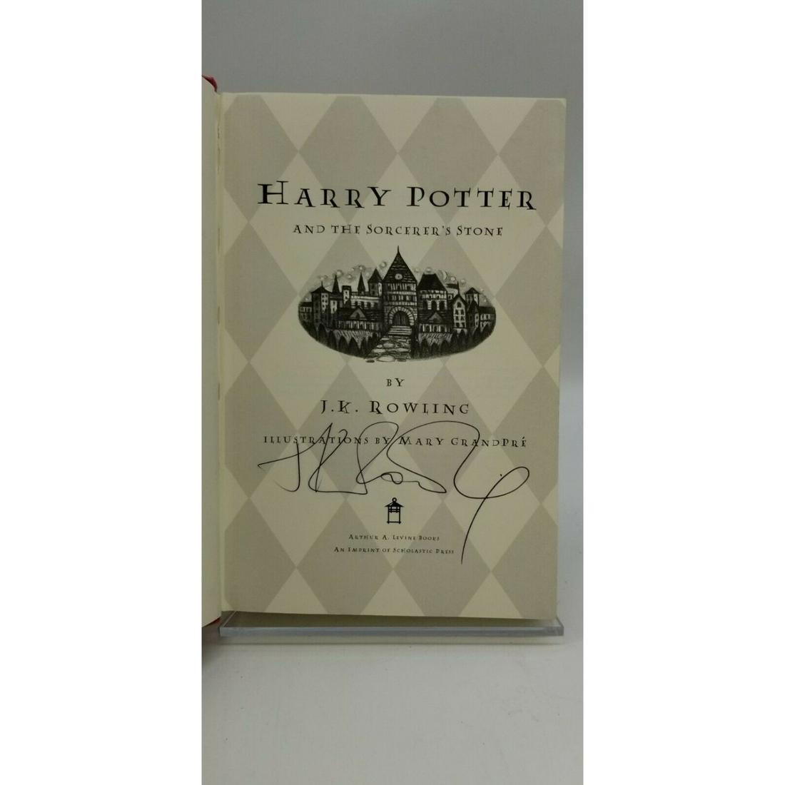 Harry Potter and the Sorcerers Stone 1st Edition SIGNED by Author J.K Rowling (1 of 2)