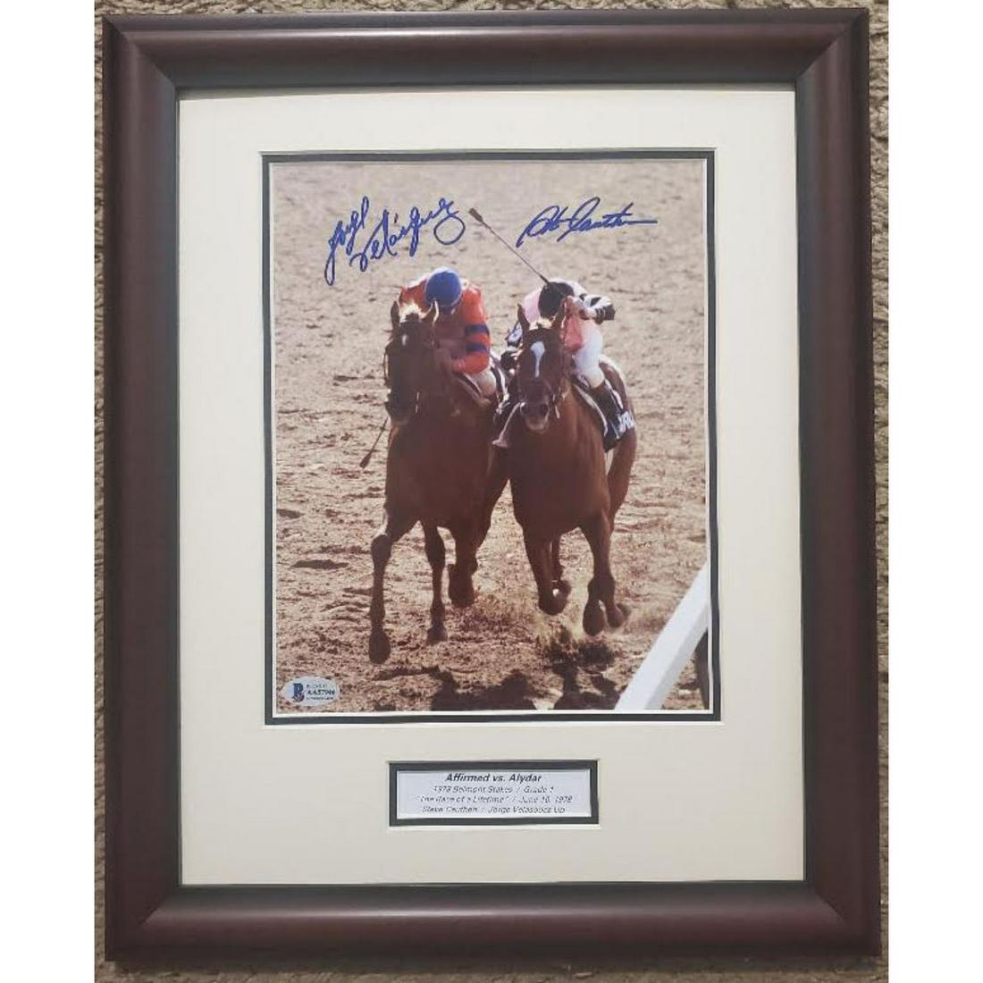 Affirmed / Alydar BAS: Affirmed holds off Alydar to win the 1978 Belmont Stakes and the Triple Crown. 8" x 10" double signed photo by Steve Cauthen, rider of Affirmed and Jorge Velasquez, rider of runner up Alydar. Beautifu