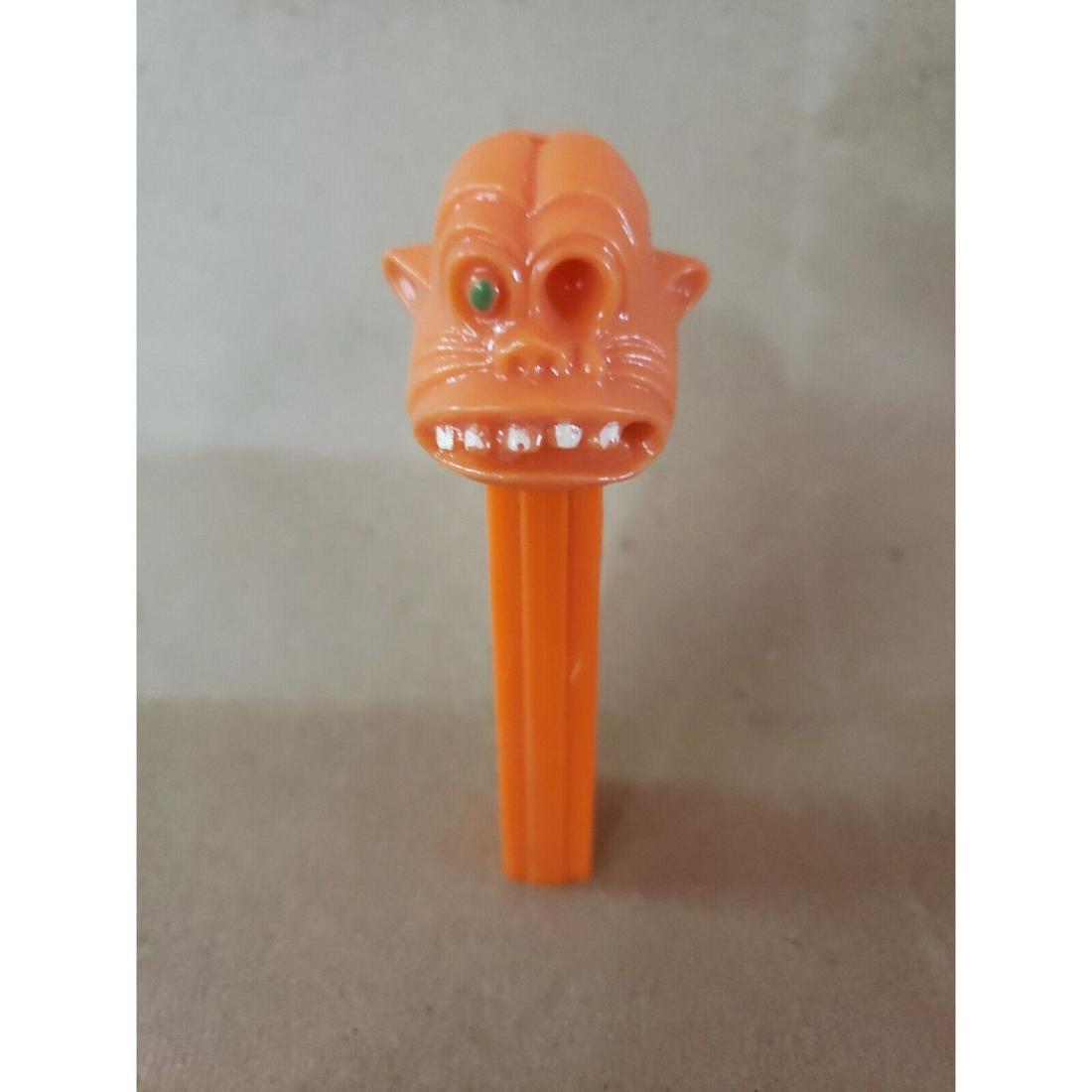 orange ONE EYED-MONSTER Pez mint condition: orange ONE EYED-MONSTER Pez mint condition