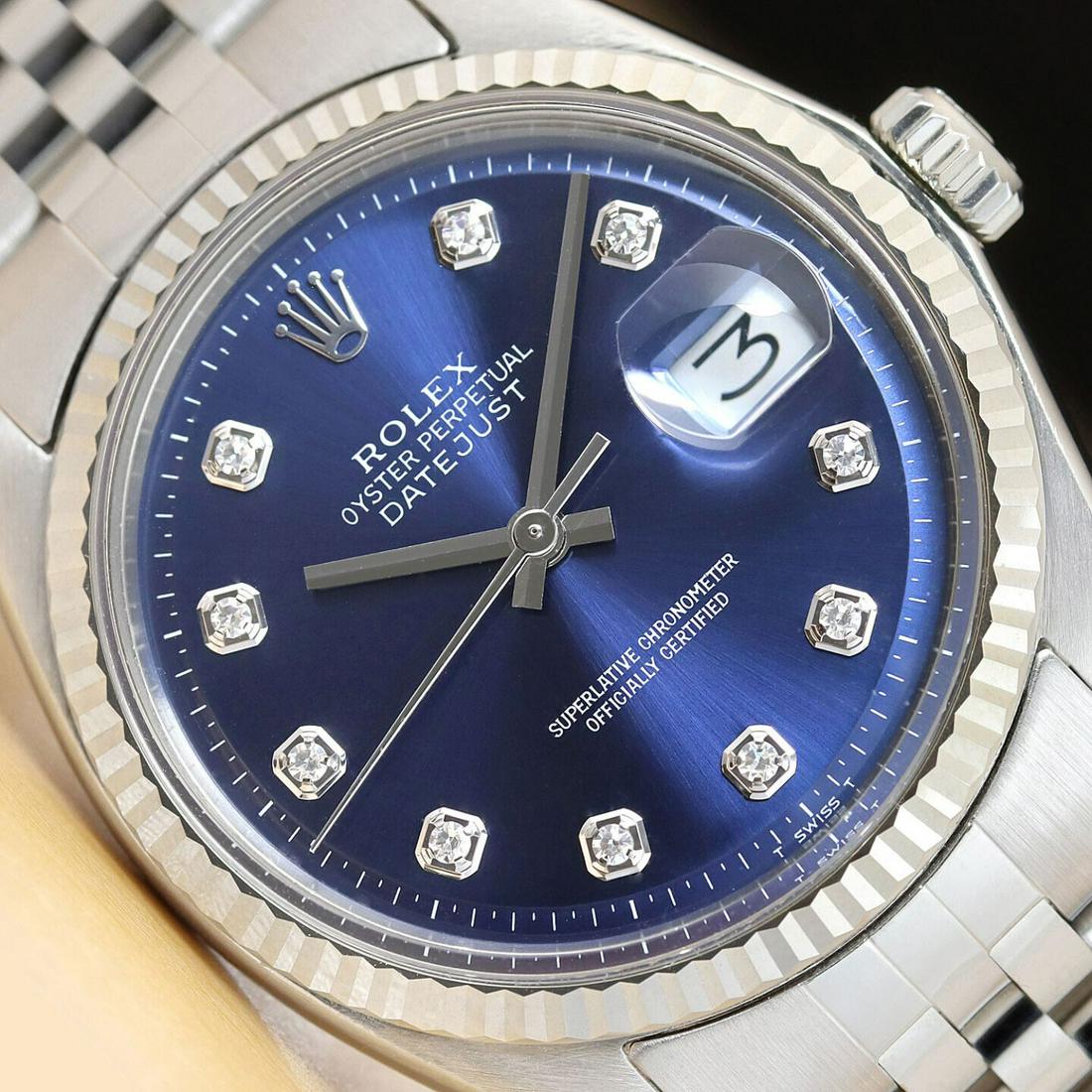 Mens 18k White Gold & Stainless Steel Rolex Datejust With A Blue Diamond DIal: Mens 18k White Gold & Stainless Steel Rolex Datejust With A Blue Diamond DIal . This is an authentic Rolex watch with a Rolex 18K white gold fluted bezel, custom stainless steel jubilee bracelet, and