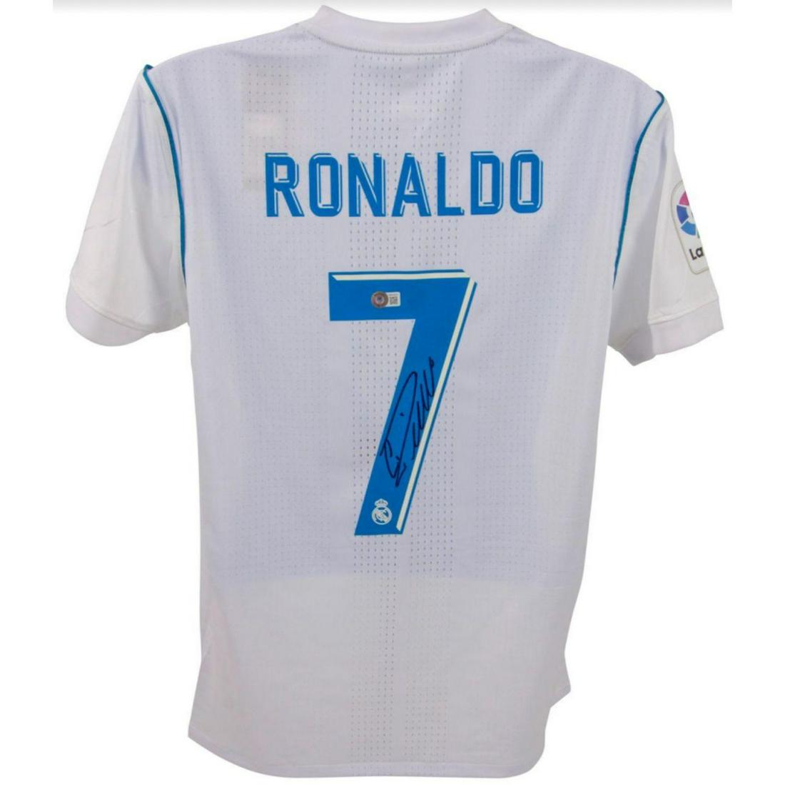 Cristiano Ronaldo Signed Real Madrid Home Jeresy (Beckett): The lot / autograph(s) includes an official Beckett Authentication Services serially-numbered hologram and matching COA for authenticity purposes.Size Large This is a stock item and stock images may b