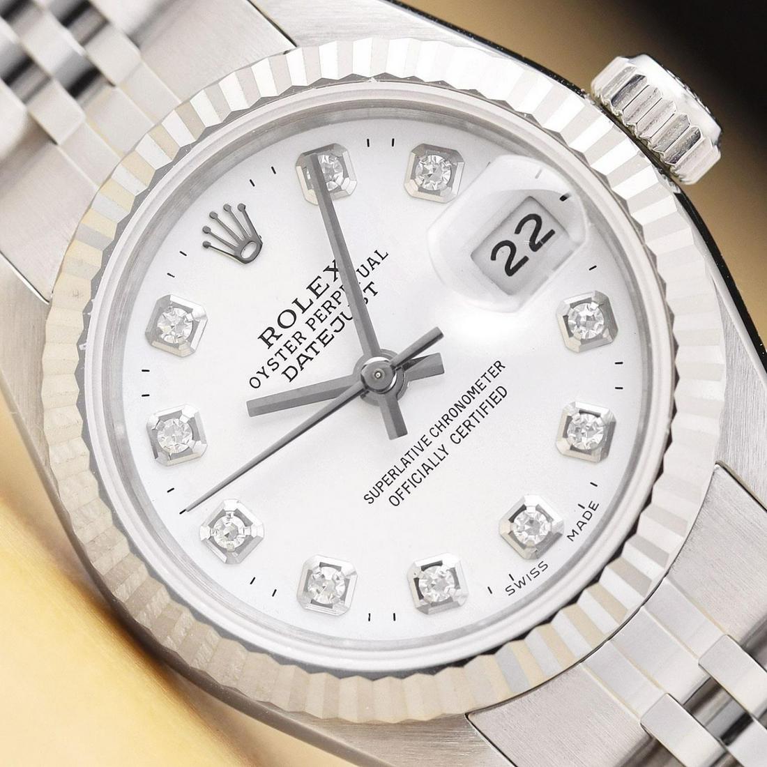 Womens 18k White Gold & Stainless Steel Rolex Datejust With A White Diamond Dial: Womens 18k White Gold & Stainless Steel Rolex Datejust With A White Diamond Dial. This is an authentic Rolex watch with custom stainless steel jubilee bracelet, Rolex dial with added diamond markers,
