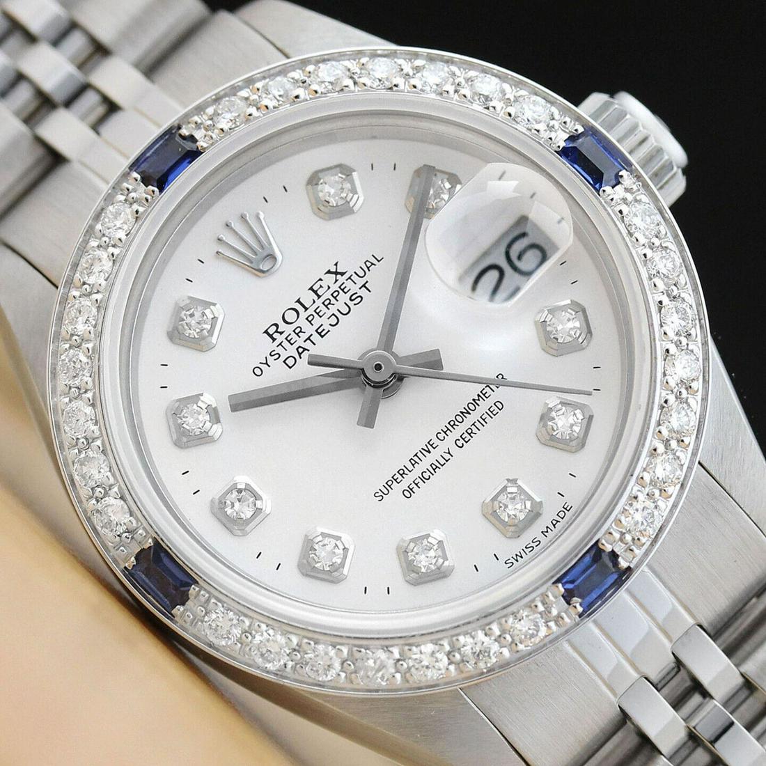 Womens 18k White Gold & Stainless Steel Rolex Datejust With A White Diamond Dial & Sapphire Diamond: Womens 18k White Gold & Stainless Steel Rolex Datejust With A White Diamond Dial & Sapphire Diamond Bezel. This is an authentic Rolex watch with a Rolex dial with added genuine diamond markers, custom