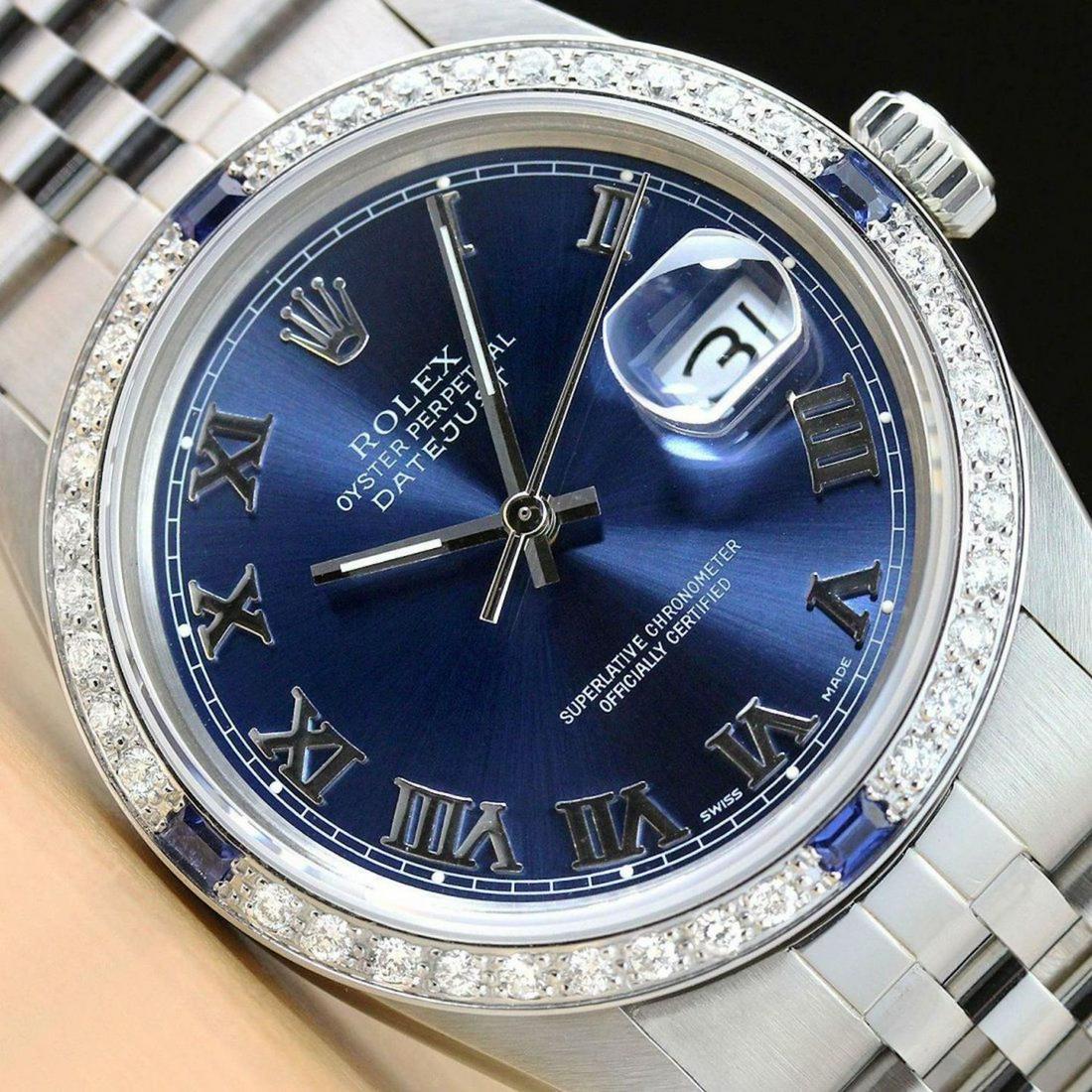 MENS ROLEX DATEJUST ROMAN 18K WHITE GOLD SAPPHIRE DIAMOND & STEEL WATCH: This is an authentic Rolex watch with an original Rolex stainless steel jubilee bracelet, Rolex dial with added roman hour markers, custom 18K white gold sapphire diamond bezel.
