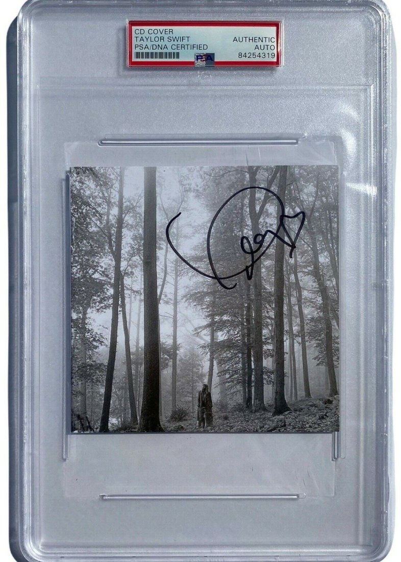 TAYLOR SWIFT SIGNED FOLKLORE CD COVER ALBUM 1989 LOVER EVERMORE PSA/DNA SLABBED!: TAYLOR SWIFT SIGNED FOLKLORE CD COVER ALBUM 1989 LOVER EVERMORE PSA/DNA SLABBED!