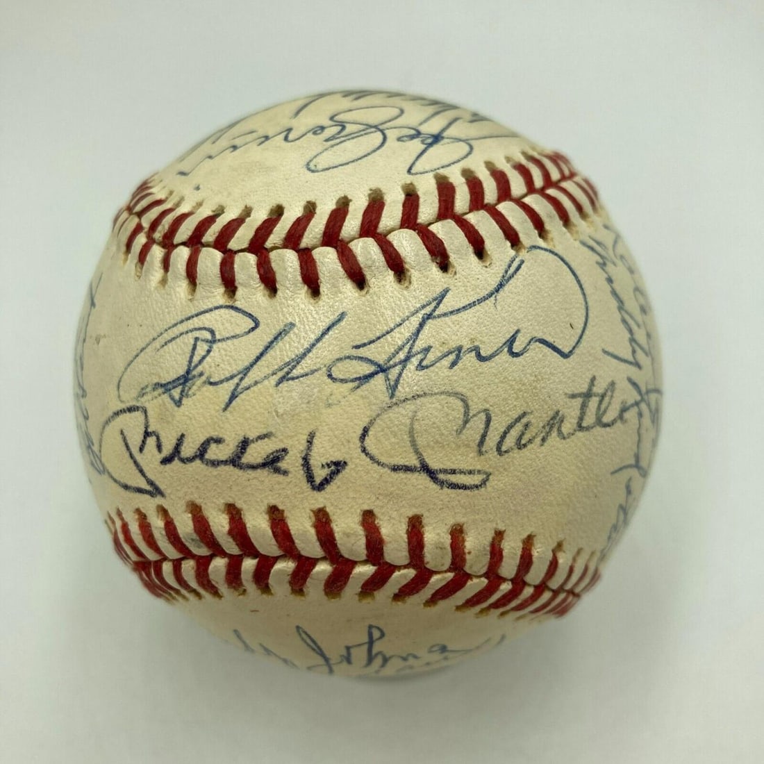 Hall Of Famers & Multi-Signed Baseball w/23 Signatures Including Mickey Mantle & Stan Musial (JSA: Hall Of Famers & Multi-Signed Baseball w/23 Signatures Including Mickey Mantle & Stan Musial (JSA LOA) Signatures Include: Enos Slaughter; Earl Averill; Bob Lemon; Mickey Mantle; Freddie Lindstrom; Mo