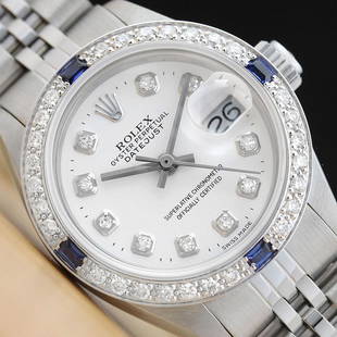 LADIES ROLEX DATEJUST 18K WHITE GOLD DIAMOND SAPPHIRE & STEEL WATCH - WHITE DIAL: LADIES ROLEX DATEJUST 18K WHITE GOLD DIAMOND SAPPHIRE & STEEL WATCH - WHITE DIAL (This is an authentic Rolex watch with a Rolex dial with added genuine diamond markers, custom 18K white gold sapphire