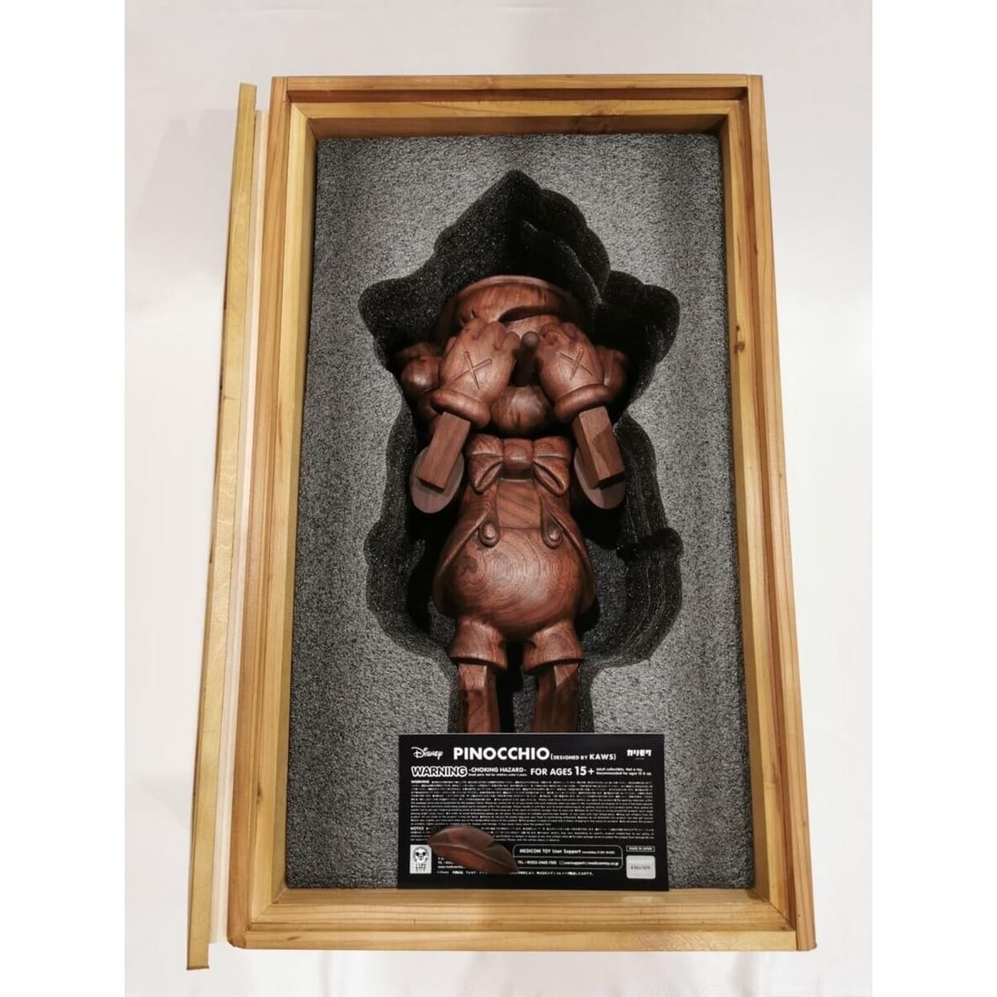 KAWS Karimoku Pinocchio Wood Sculpture (1 of 8)