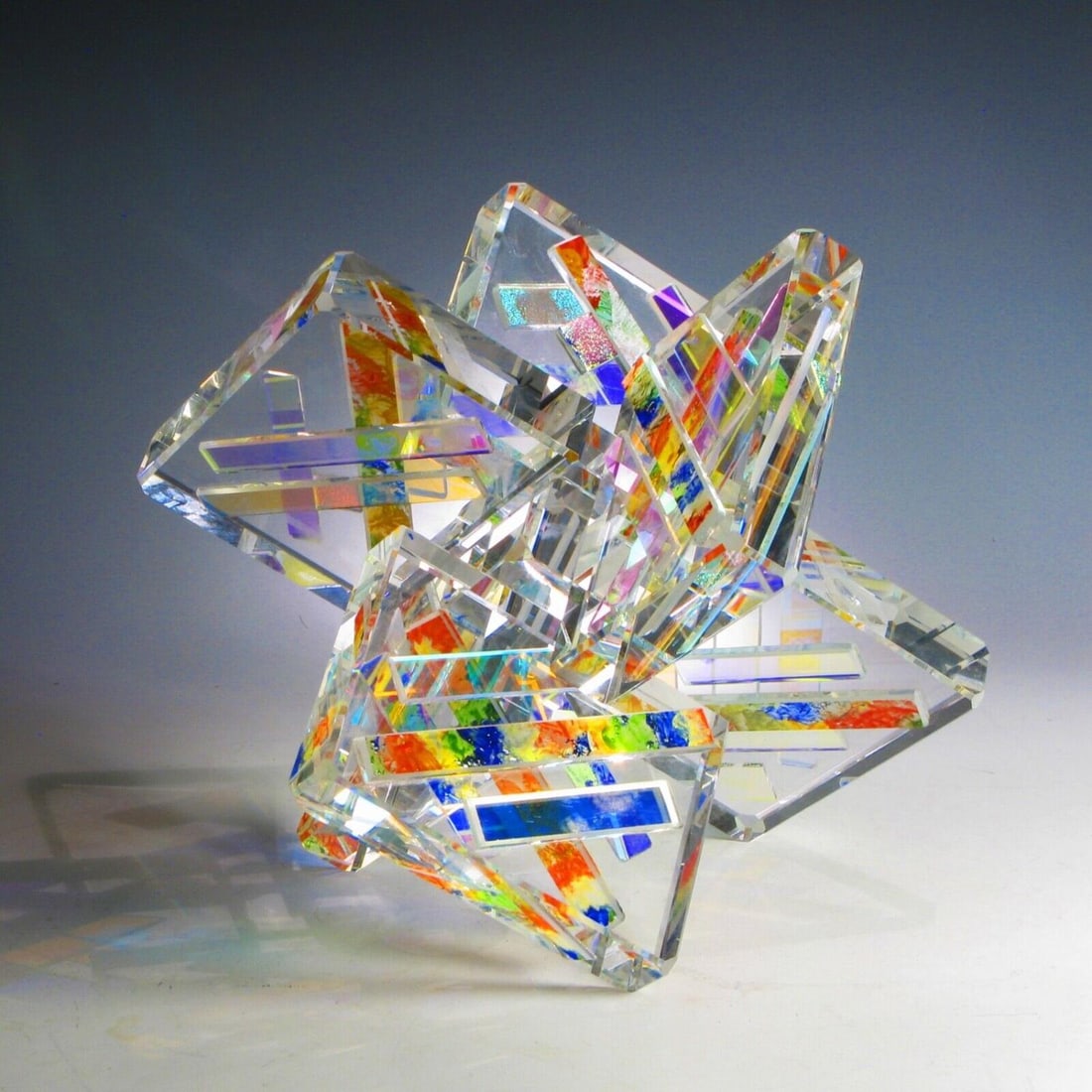 NEW Optic Crystal Dichroic Glass Sculpture "ASTERIX" by the Artist Ray Lapšys: "ASTERIX"A new brilliant Art Glass Master piece. Created by Ray LAPŠYS as a very Special Edition. OPTIC CRYSTALENAMELED GLASSDICHROIC CRYSTALDisplayable in multiple variations.9" X 9" X 8.5"SIGNEDRL 