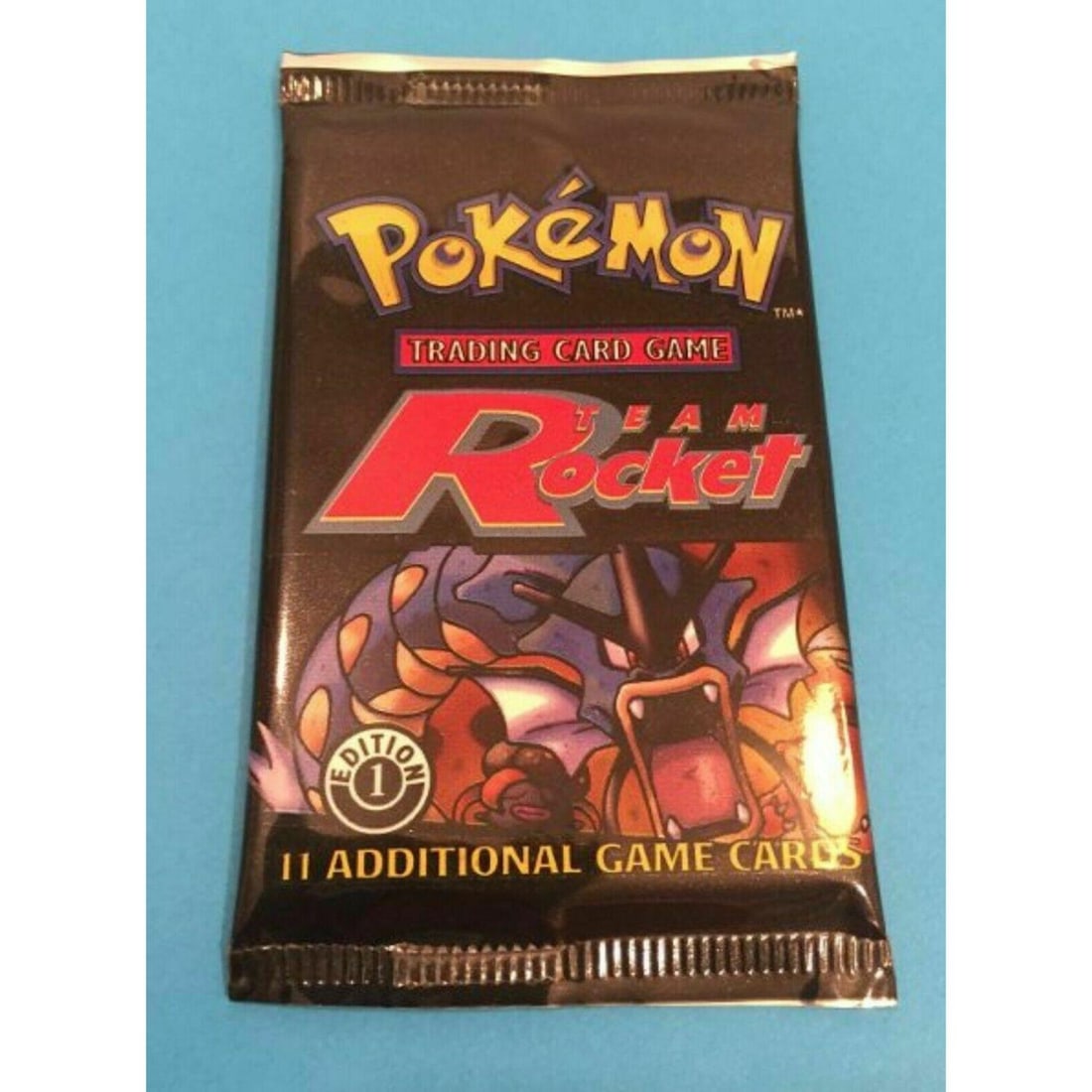 Pokemon 1st Edition Team Rocket Booster Pack Gyarados Art - Unweighed (1 of 1)
