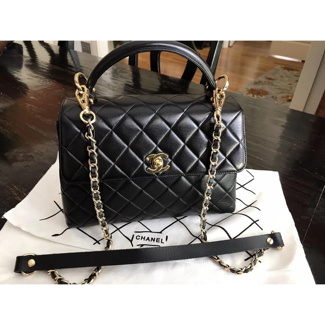 *Chanel* Vintage Quilted *Kelly* Top Handle Bag *Lambskin* Black Small Bag: Condition: Pre-owned:In good ConditionIt has some wear in the front of the bag. dents, wrinkles and scratches on the whole bag. Minor scratches on hardware. Overall is in good condition as seen in pic