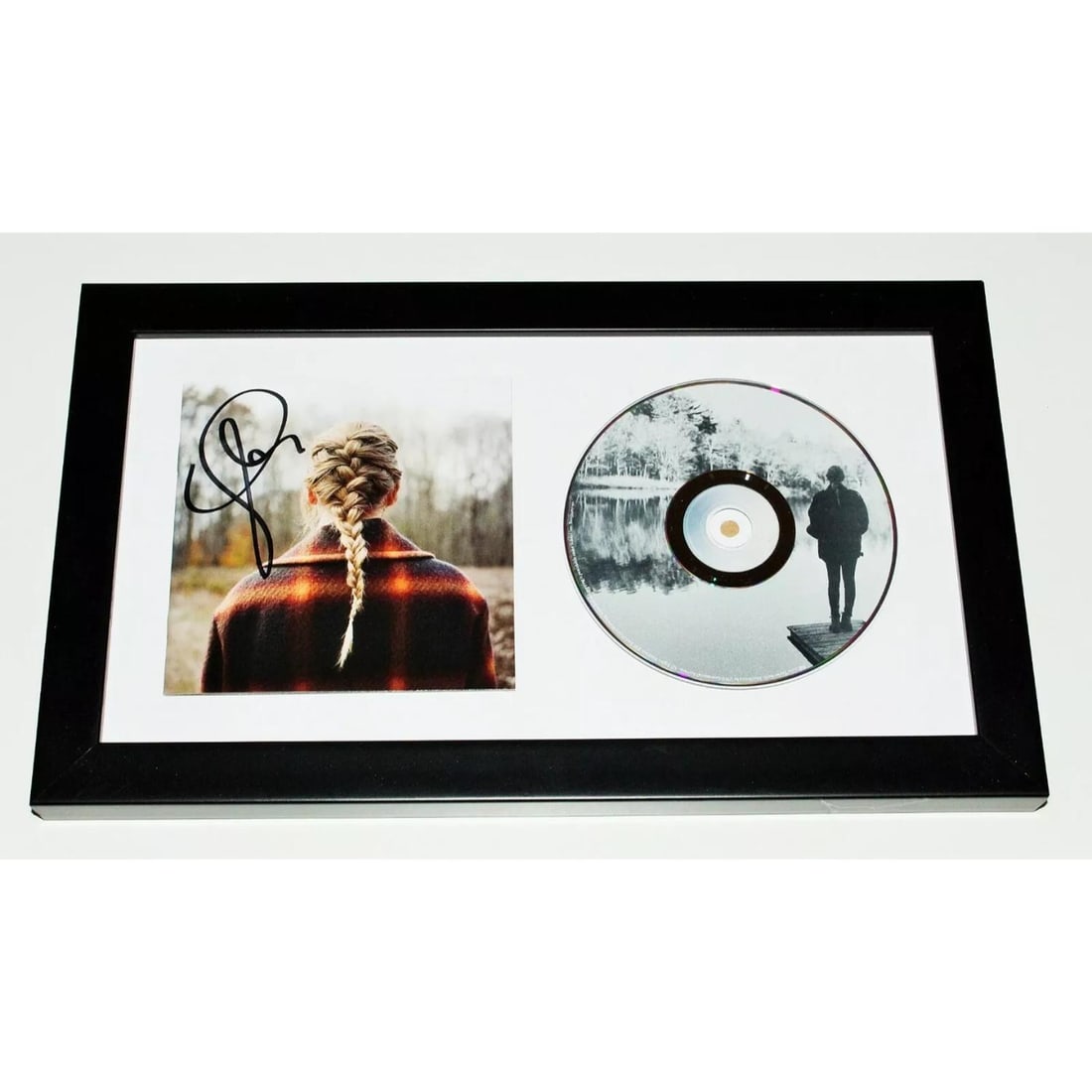 TAYLOR SWIFT SIGNED FRAMED EVERMORE CD ALBUM COVER COA 1989 FOLKLORE RED LOVER: You are looking at a matted and framed 'Evermore' CD cover autographed by TAYLOR SWIFTShe signed this in 2021The item comes with a Certificate of Authenticity