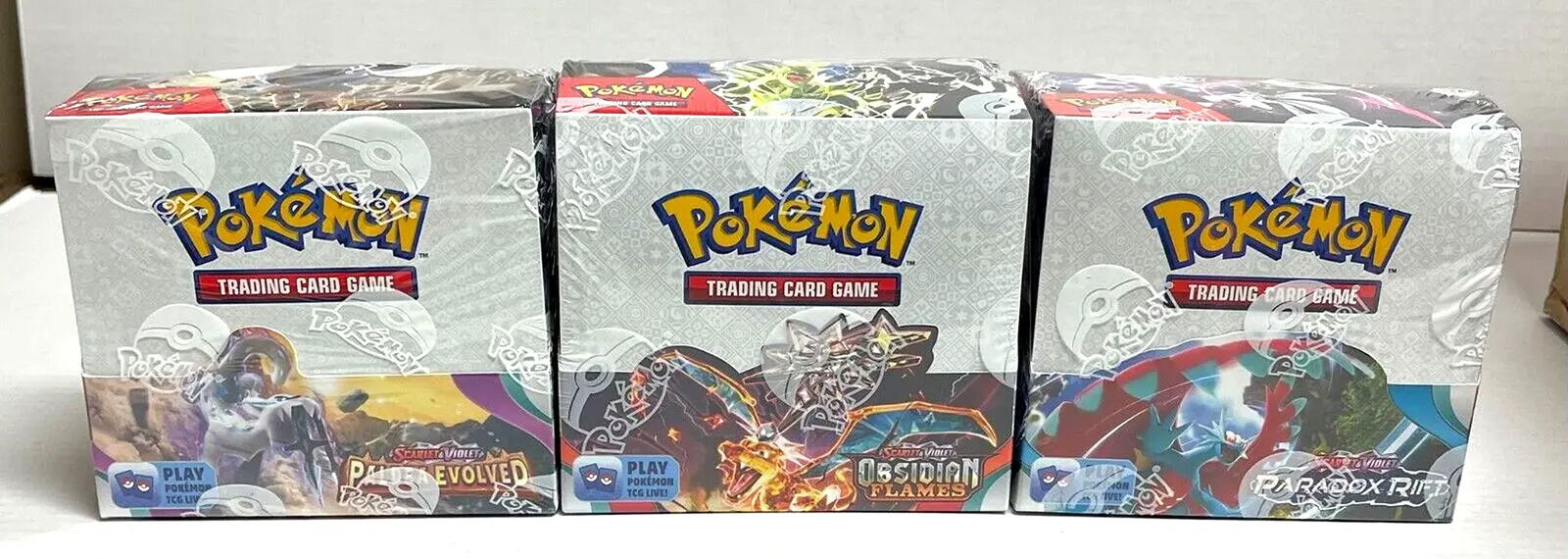 Pokemon TCG Booster Box Lot of 3 Paradox Rift - Obsidian Flames - Paldea Evolved (1 of 5)