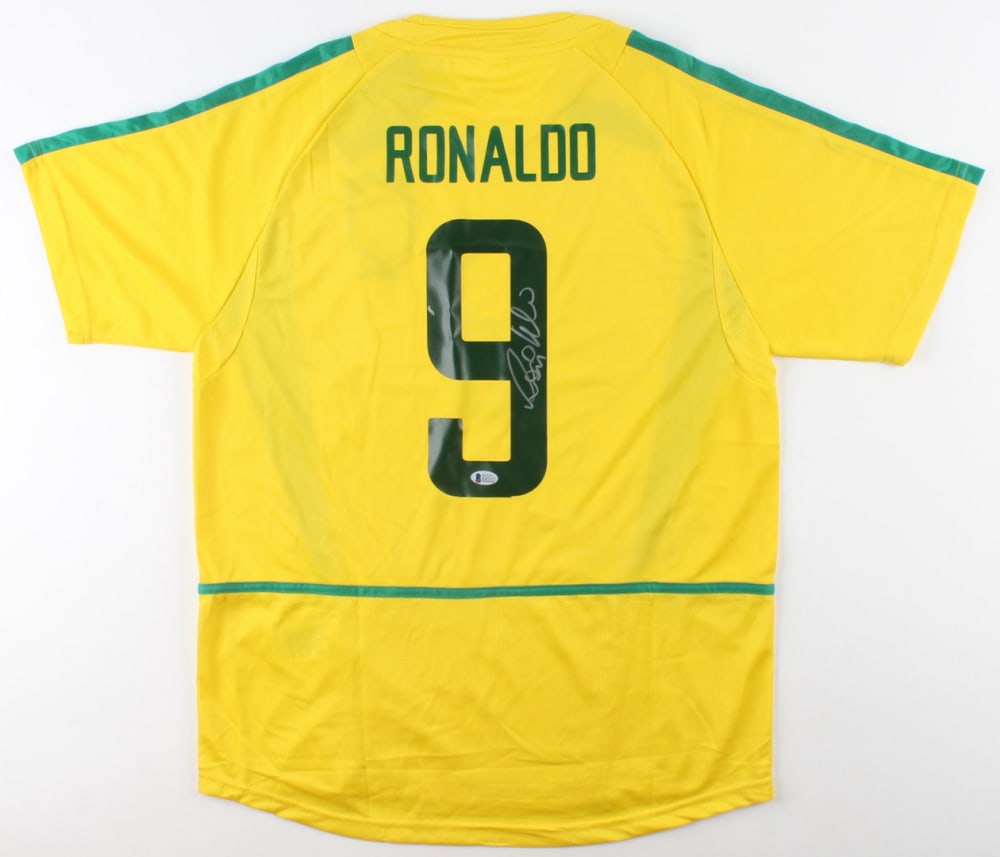 Ronaldo Signed Jersey (Beckett COA): Custom on-field style jersey. Everything is printed on, size XL. Has been hand-signed by Ronaldo. The lot / autograph(s) includes an official Beckett Authentication Services serially-numbered hologram