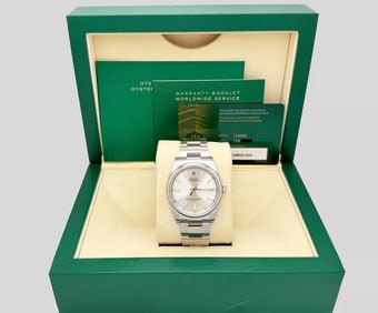 2024 Rolex Oyster Perpetual 126000 36mm Silver Dial Stainless Steel Box Paper