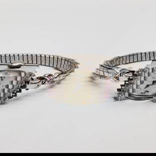Art Deco 14K White Gold Mechanical Watch: Antique Art Deco 14K White Gold, Diamonds, & Rubies Ladies Mechanical Watch. Please Note, The Bracelet is Not Gold.However bracelent is marked, "PACLITA USJ STRETCH WATCH BAND' Which islikely made by